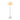 Tarna white floor lamp with glowing mushroom dome shade on a slim flared tulip-style stem